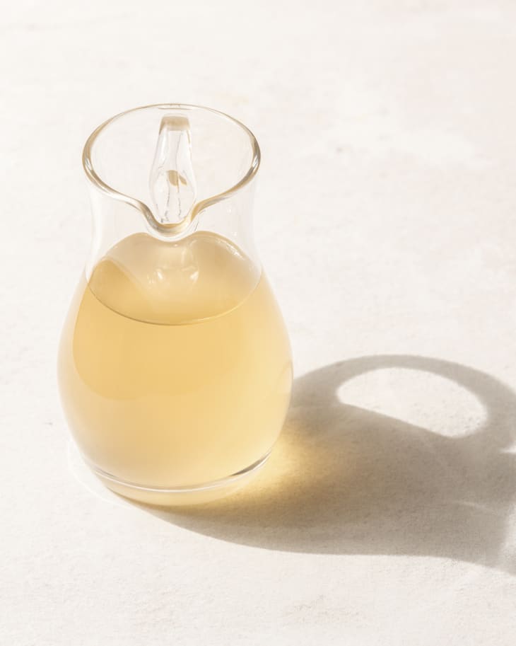 Ginger syrup in a glass pitcher